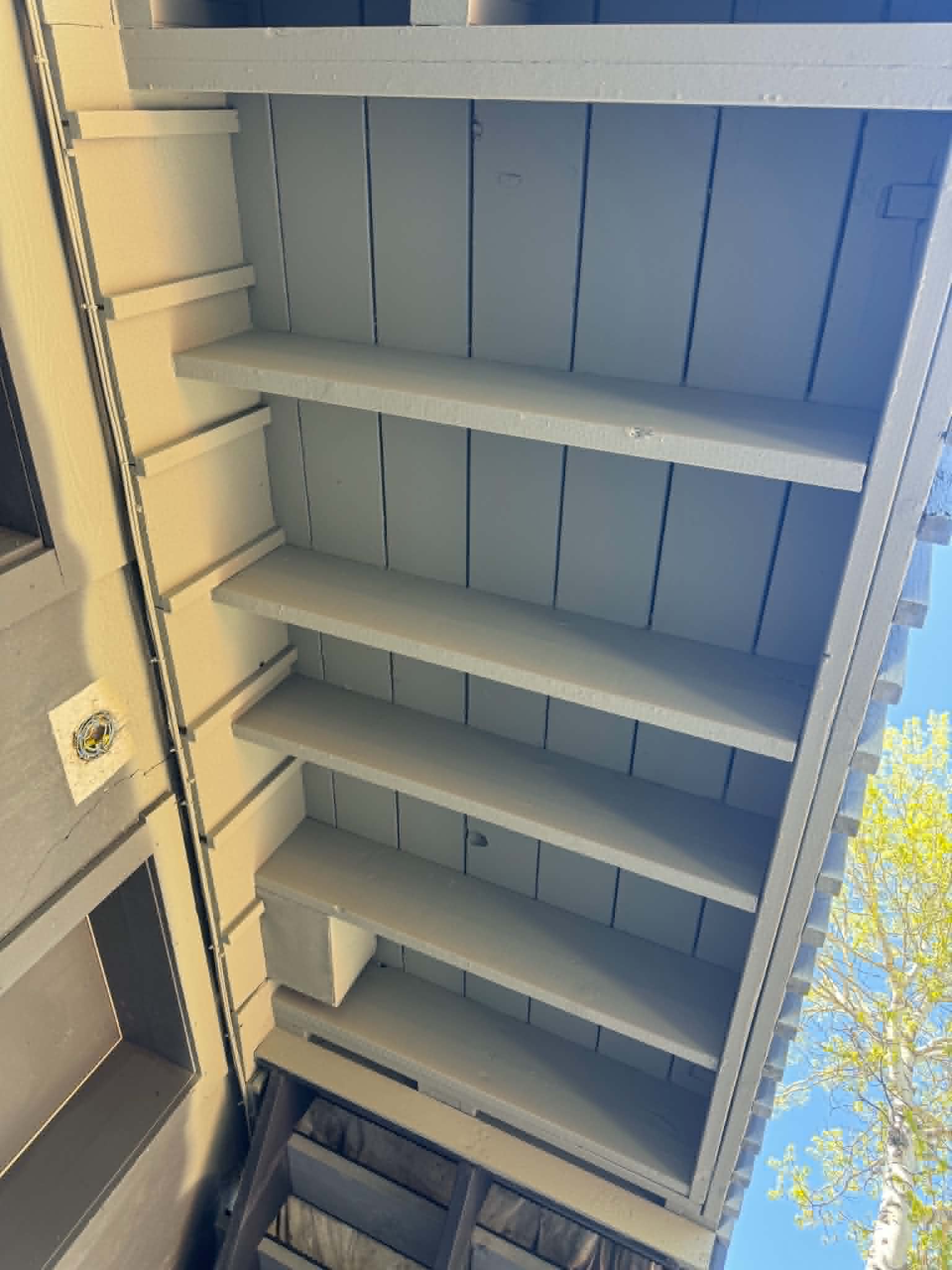 Freshly painted porch ceiling soffit — clean finish